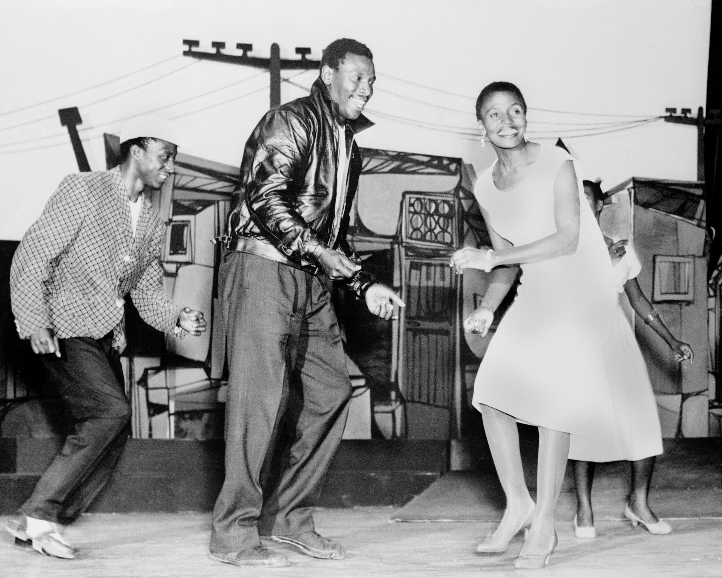 Nathan Mdledle (center) and Miriam Makeba performing in King Kong. Photo via Bettmann/Getty Images.